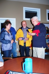 Club's newest members, Teresa And David receive club burgee from Vice Commodore Alan H